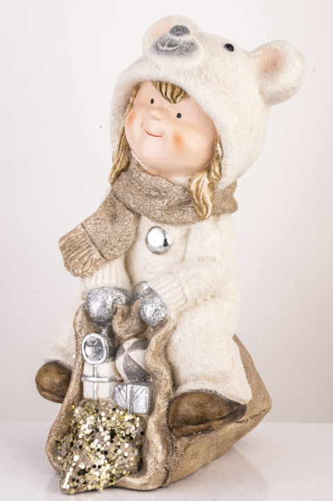Dziewczynka ceramiczna beżowo złota z misiem (147470) Dziewczynka ceramiczna beżowo złota z misiem (147470)